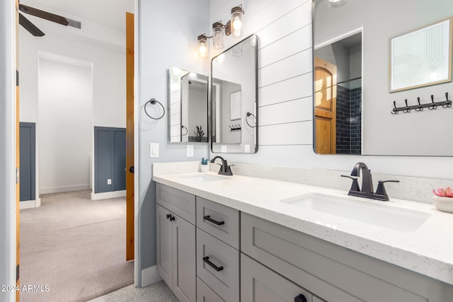 bathroom featuring vanity and ceiling fan