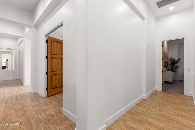 hallway featuring light hardwood / wood-style floors