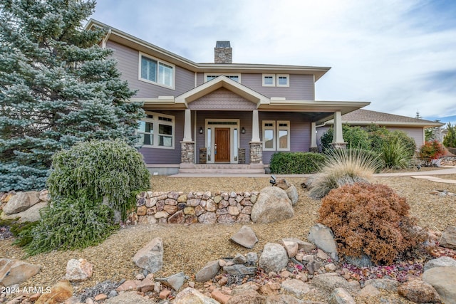 craftsman inspired home with a porch