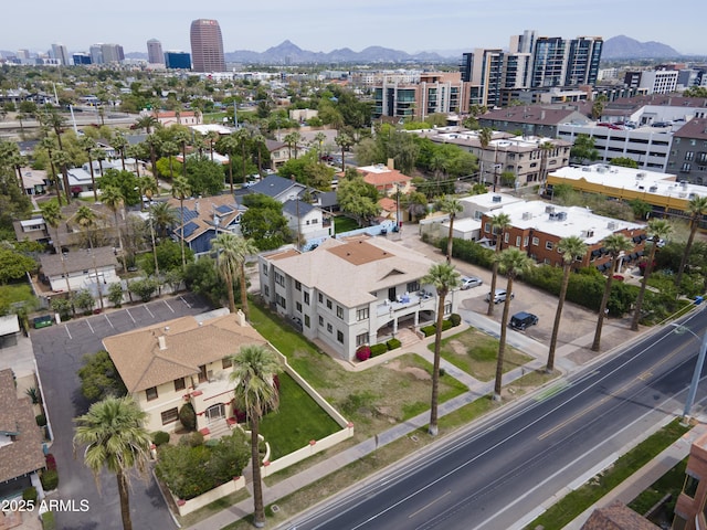 aerial view with a view of city and a mountain view