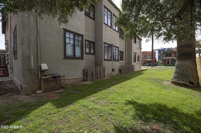 view of yard featuring central AC unit