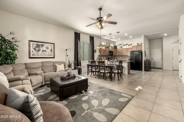 tiled living room with ceiling fan