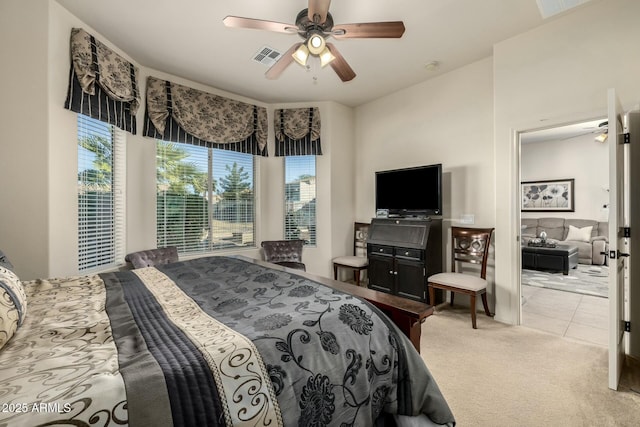 carpeted bedroom with ceiling fan