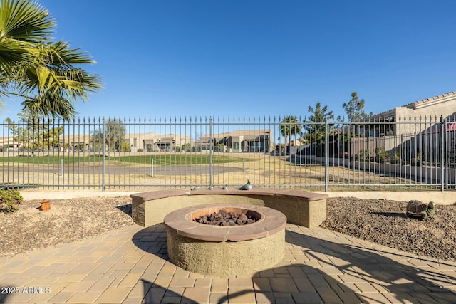 view of patio / terrace with a fire pit