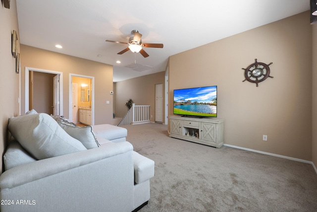 carpeted living room featuring recessed lighting, ceiling fan, and baseboards