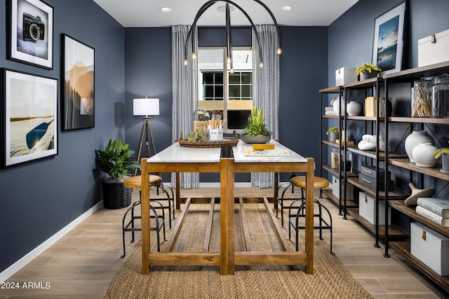 dining area with light wood-type flooring