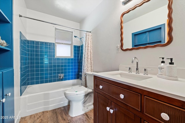 7813 N 17th Dr, Phoenix, AZ 85021 - bathroom featuring shower / bathtub combination with curtain, wood finished floors, toilet, and vanity