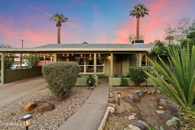 7813 N 17th Dr, Phoenix, AZ 85021 - ranch-style house featuring concrete driveway, an attached carport, and covered porch
