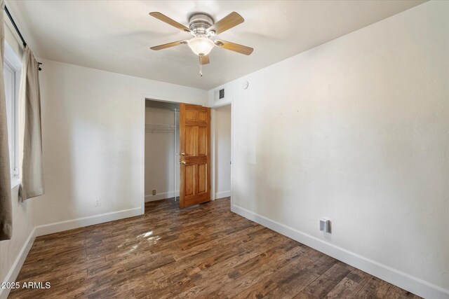 7813 N 17th Dr, Phoenix, AZ 85021 - unfurnished bedroom featuring baseboards, visible vents, wood finished floors, and a closet