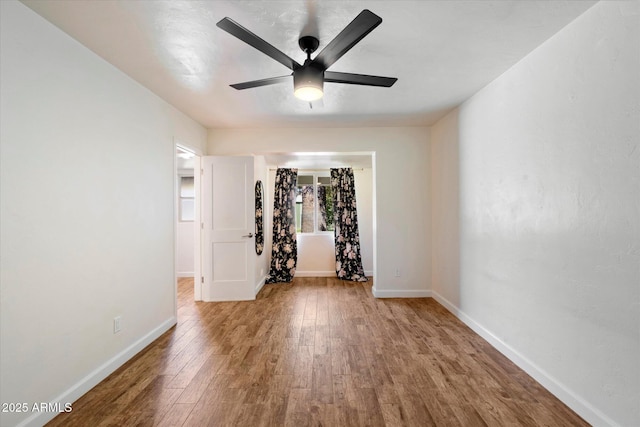 7813 N 17th Dr, Phoenix, AZ 85021 - empty room featuring baseboards, wood finished floors, and ceiling fan