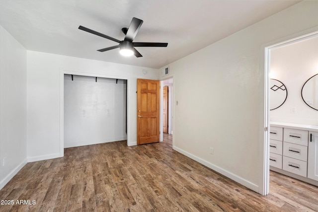7813 N 17th Dr, Phoenix, AZ 85021 - unfurnished bedroom featuring visible vents, light wood-type flooring, baseboards, and a closet
