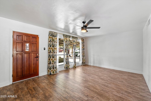 7813 N 17th Dr, Phoenix, AZ 85021 - entryway featuring wood finished floors, ceiling fan, visible vents, and baseboards
