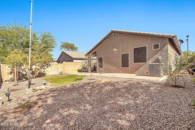 rear view of property with a patio area