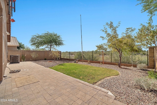 view of patio with central AC unit