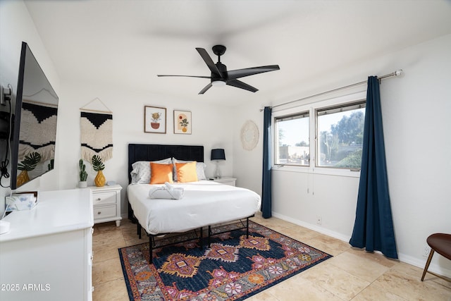 bedroom featuring ceiling fan and light tile patterned floors