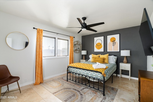 bedroom featuring ceiling fan