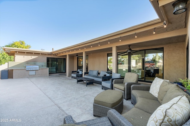 view of patio / terrace with outdoor lounge area, area for grilling, ceiling fan, and a grill