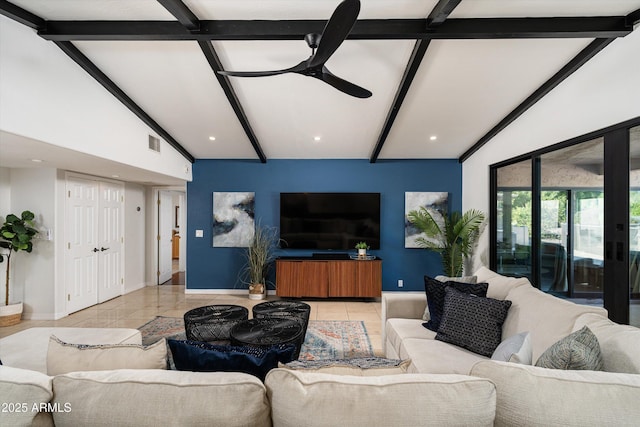 living room featuring light tile patterned floors, vaulted ceiling with beams, and ceiling fan