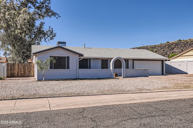 1718 W Voltaire Ave, Phoenix, AZ 85029 - single story home featuring concrete driveway and an attached garage