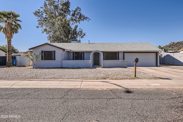 1718 W Voltaire Ave, Phoenix, AZ 85029 - ranch-style home featuring a garage and driveway