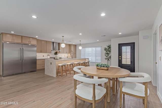 8119 E San Miguel Ave, Scottsdale, AZ 85250 - dining space featuring recessed lighting and light wood-style floors