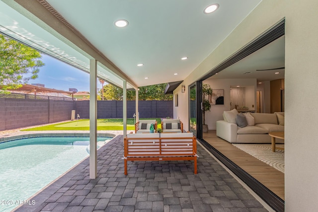 8119 E San Miguel Ave, Scottsdale, AZ 85250 - fenced backyard with outdoor lounge area and a patio area