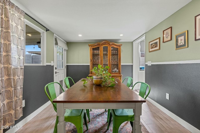 dining space with baseboards