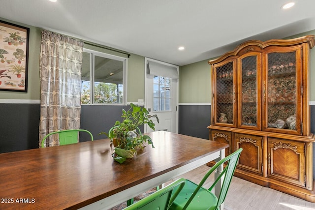 dining space with recessed lighting