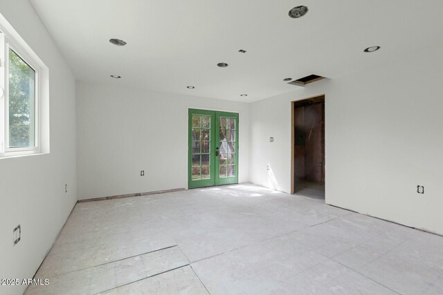empty room featuring recessed lighting