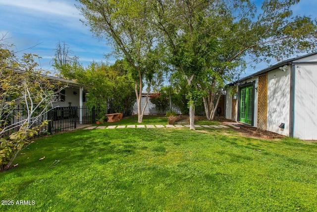 view of yard with a fenced backyard