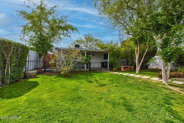 view of yard featuring a fenced backyard