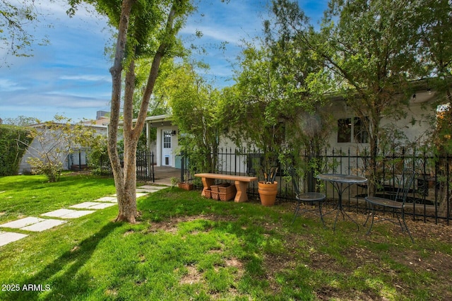 view of yard featuring fence