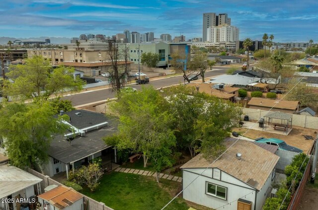 birds eye view of property featuring a view of city