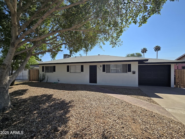 ranch-style home with a garage