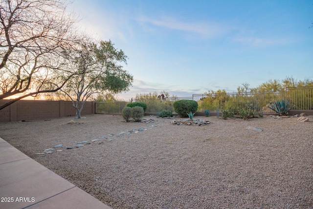 view of yard with a fenced backyard