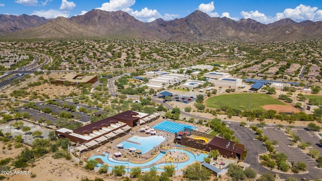 birds eye view of property featuring a mountain view