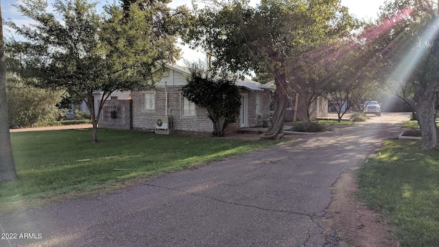 exterior space featuring a lawn