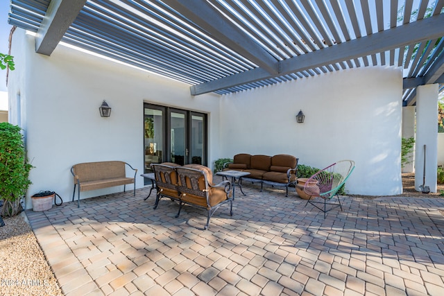 view of patio with an outdoor hangout area and a pergola