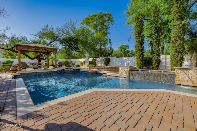 view of swimming pool featuring a gazebo, a patio area, and pool water feature