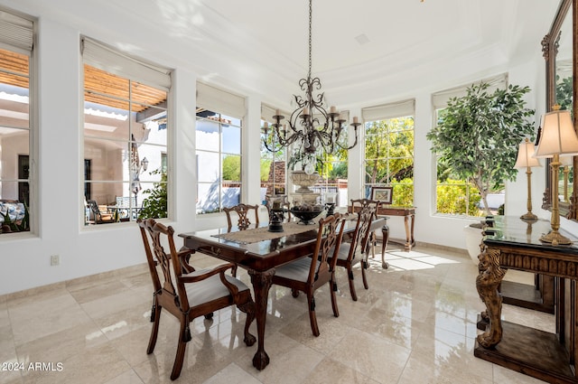 dining space with a notable chandelier and plenty of natural light