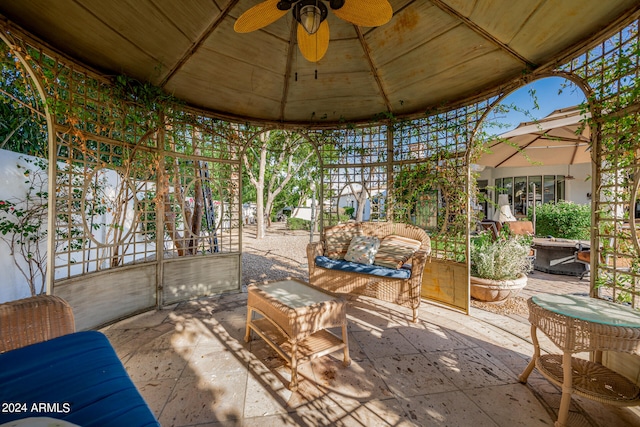 view of patio with a gazebo and ceiling fan