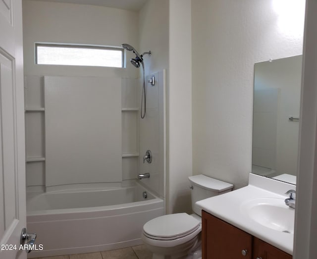 full bathroom featuring washtub / shower combination, vanity, toilet, and tile patterned floors