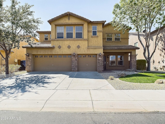 view of front of home with a garage