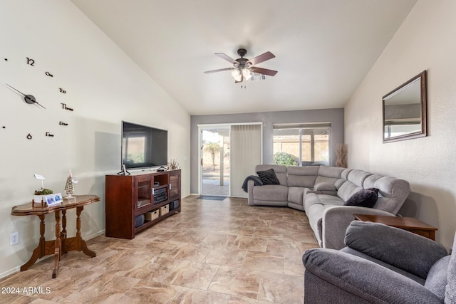 living room featuring ceiling fan and vaulted ceiling