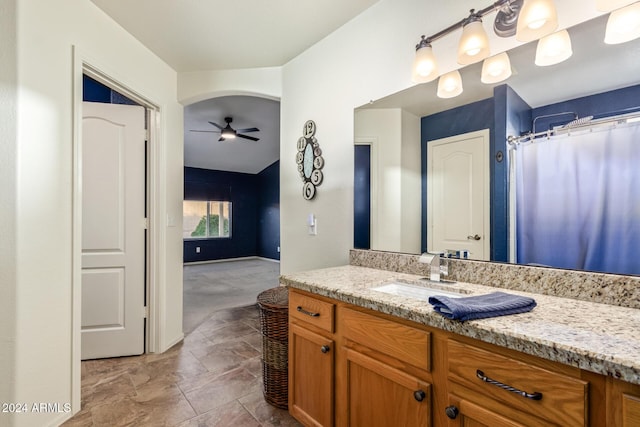 bathroom with vanity and ceiling fan