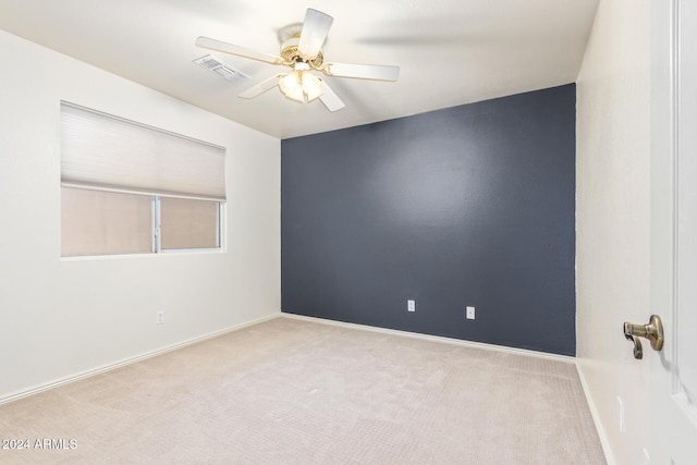 carpeted empty room with ceiling fan