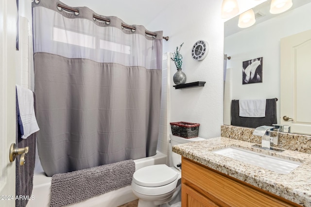 full bathroom featuring vanity, toilet, and shower / bath combo with shower curtain