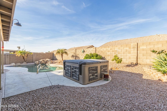 view of yard with a fenced in pool