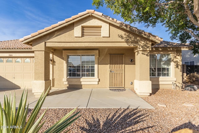 view of front of property featuring a garage