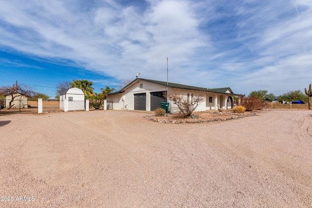 single story home featuring a garage